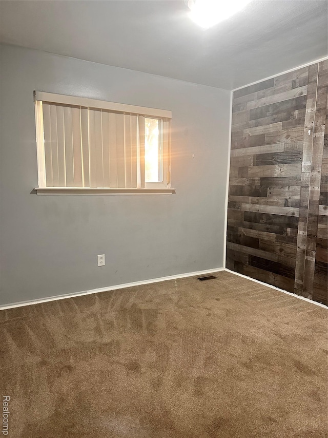 26304 Patricia Ave, Sterling Heights, MI 48091 - unfurnished room with carpet flooring and baseboards
