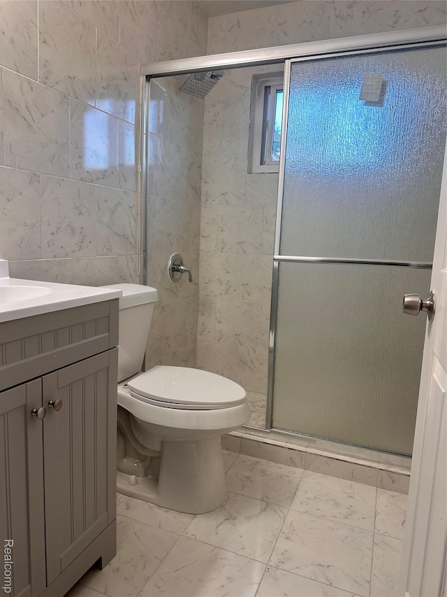 26304 Patricia Ave, Sterling Heights, MI 48091 - full bath featuring marble look tile flooring, a stall shower, vanity, toilet, and tile walls