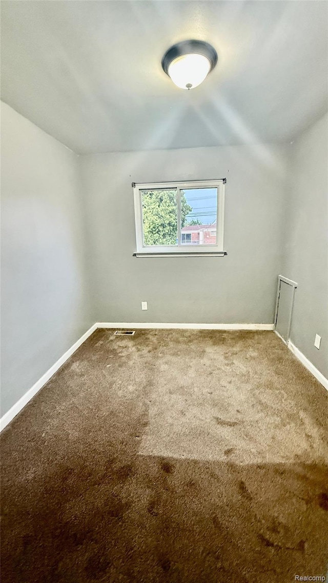 26304 Patricia Ave, Sterling Heights, MI 48091 - carpeted spare room featuring baseboards