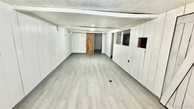 26304 Patricia Ave, Sterling Heights, MI 48091 - corridor with light wood-type flooring, wood walls, and beam ceiling