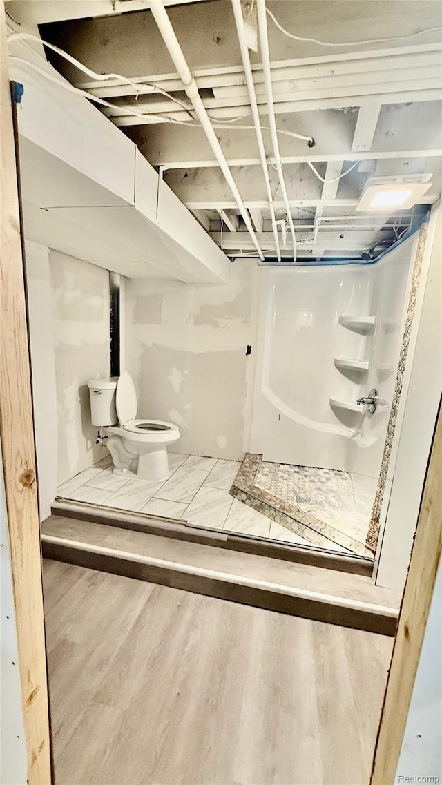 26304 Patricia Ave, Sterling Heights, MI 48091 - full bath with toilet, wood finished floors, and a shower