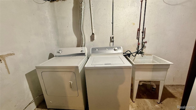 26304 Patricia Ave, Sterling Heights, MI 48091 - laundry area featuring washer and clothes dryer