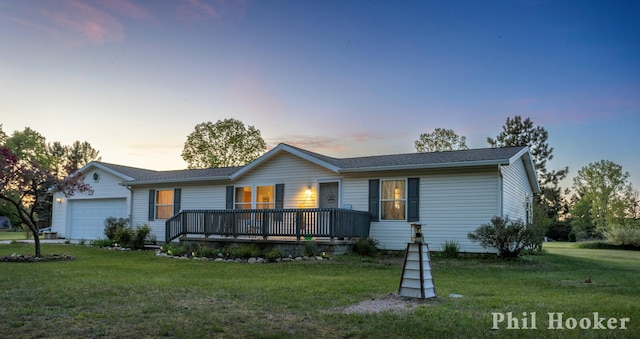 105 Penny Ln, Stanton, MI 48888 - single story home with a front yard and a garage