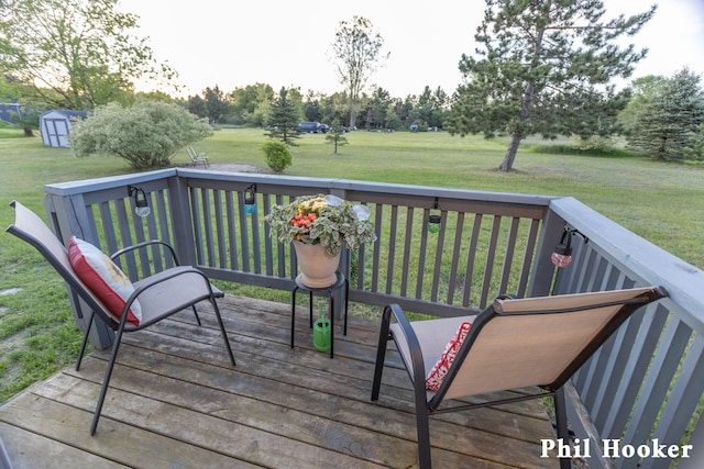 105 Penny Ln, Stanton, MI 48888 - wooden terrace featuring a yard