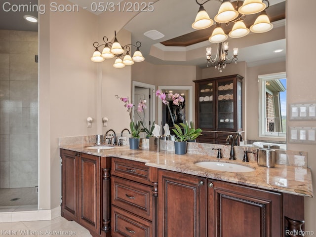 20971 Pomino Dr, Northville, MI 48167 - bathroom with a chandelier, double vanity, crown molding, a stall shower, and a tray ceiling