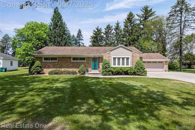 2253 Robell Dr, Commerce Twp, MI 48390 - ranch-style home with brick siding, driveway, a front lawn, and a garage