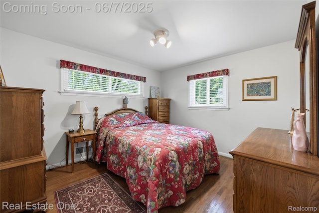 2253 Robell Dr, Commerce Twp, MI 48390 - bedroom featuring multiple windows and wood finished floors