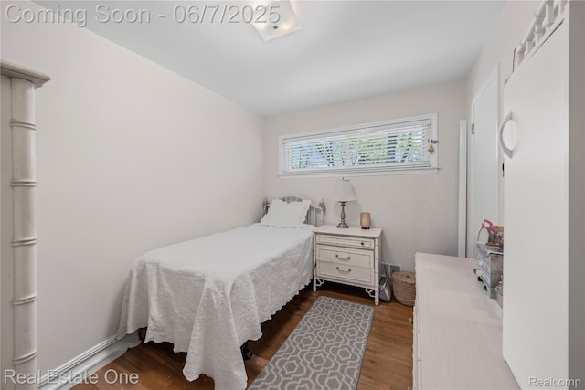 2253 Robell Dr, Commerce Twp, MI 48390 - bedroom with wood finished floors