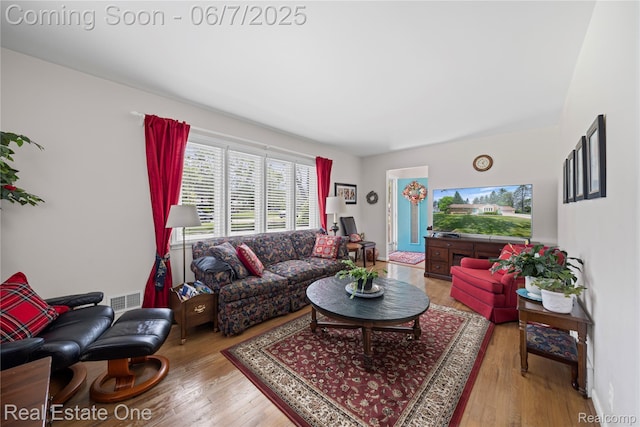 2253 Robell Dr, Commerce Twp, MI 48390 - living area with wood finished floors