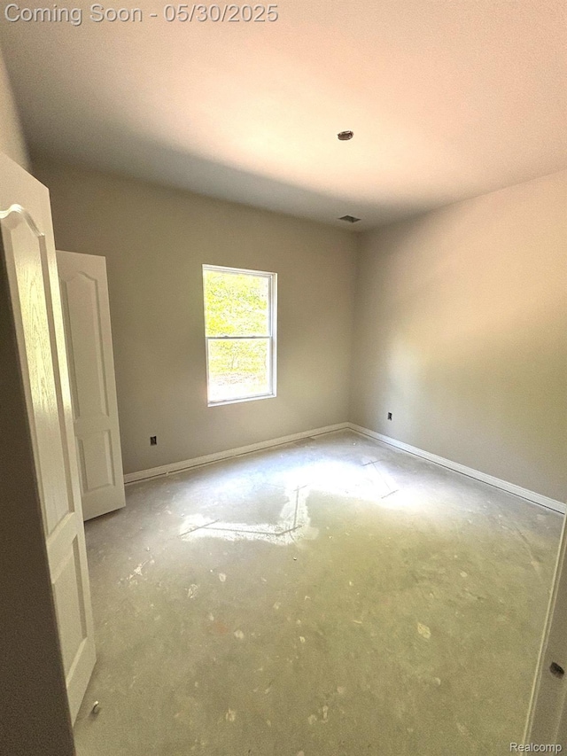 120 Whispering Pines Dr, Fenton, MI 48430 - spare room with baseboards