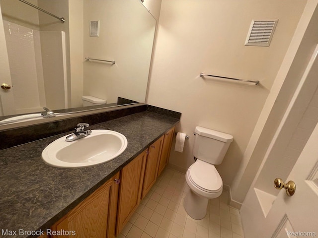 16211 Addington Dr Unit 192, Commerce Twp, MI 48390 - bathroom with toilet, tile patterned flooring, vanity, and baseboards