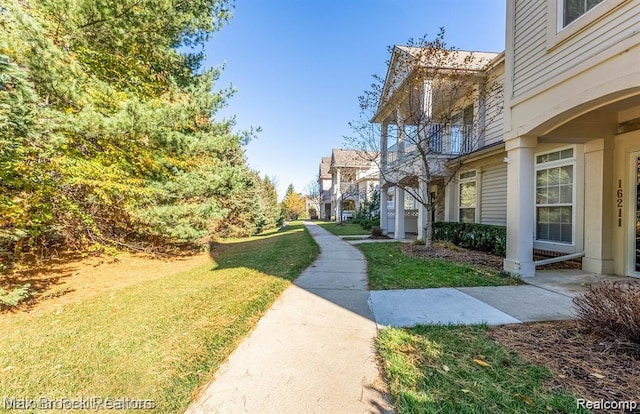 16211 Addington Dr Unit 192, Commerce Twp, MI 48390 - view of property's community with a yard