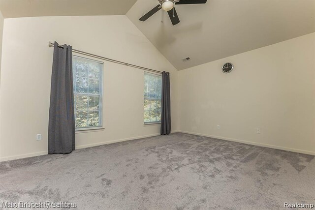 16211 Addington Dr Unit 192, Commerce Twp, MI 48390 - spare room featuring vaulted ceiling, a ceiling fan, carpet floors, and baseboards