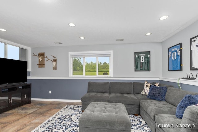 8337 Pebble Dr NE, Rockford, MI 49341 - living area featuring recessed lighting, baseboards, and stone finish floors