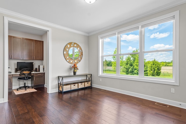 2349 Westbrooke Ct, Ann Arbor, MI 48105 - office space with built in study area, baseboards, ornamental molding, and dark wood-type flooring