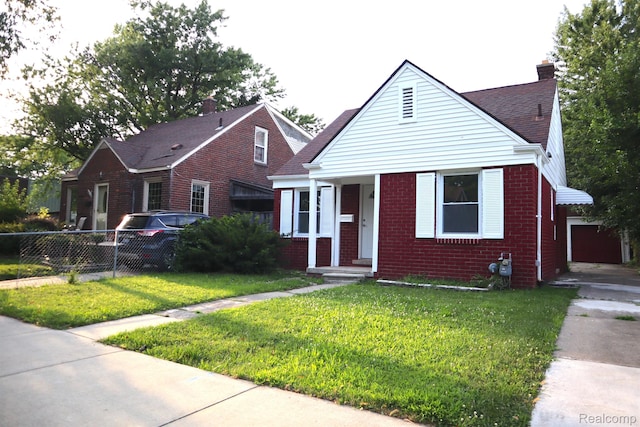 15243 Eastwood St, Detroit, MI 48205 - bungalow-style home featuring brick siding, a garage, and a chimney