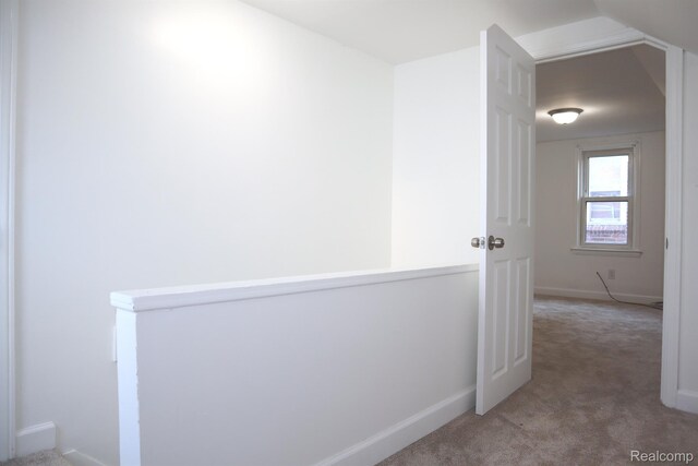 15243 Eastwood St, Detroit, MI 48205 - corridor with light carpet and baseboards