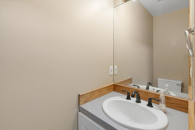 6767 Knollview Dr, Hudsonville, MI 49426 - bathroom featuring vanity