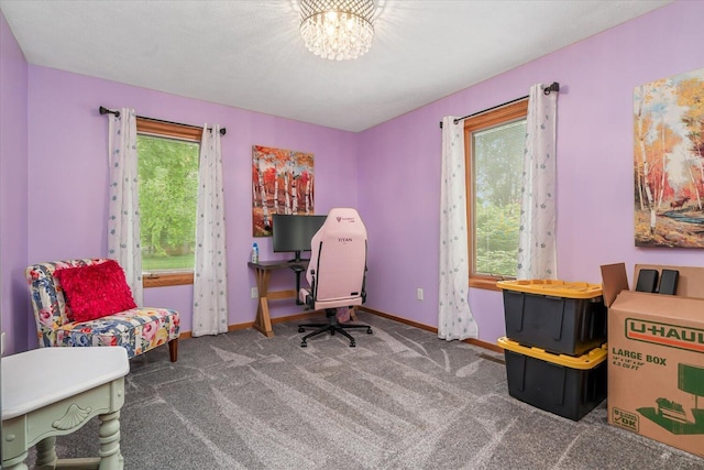 6767 Knollview Dr, Hudsonville, MI 49426 - office space featuring plenty of natural light, carpet floors, baseboards, and a chandelier