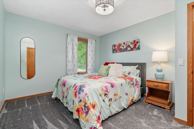6767 Knollview Dr, Hudsonville, MI 49426 - bedroom featuring carpet floors and baseboards