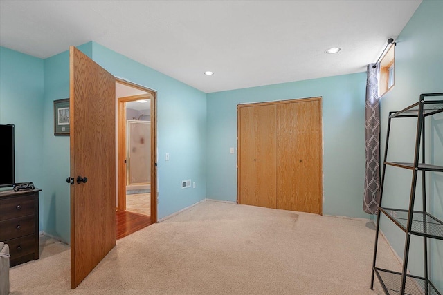 6767 Knollview Dr, Hudsonville, MI 49426 - unfurnished bedroom with carpet flooring, recessed lighting, and a closet