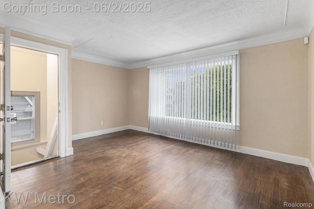 5025 Somerset Ave, Detroit, MI 48224 - unfurnished room with ornamental molding, wood finished floors, a textured ceiling, and baseboards