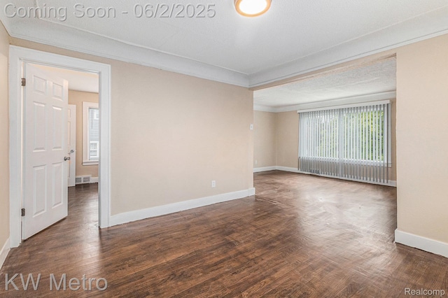 5025 Somerset Ave, Detroit, MI 48224 - unfurnished room with healthy amount of natural light, crown molding, baseboards, and wood finished floors