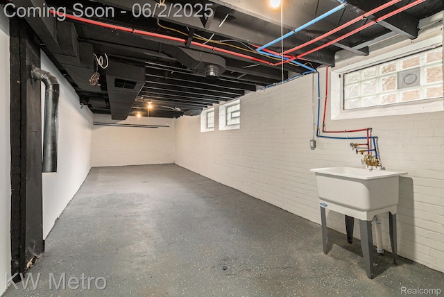 5025 Somerset Ave, Detroit, MI 48224 - basement featuring brick wall