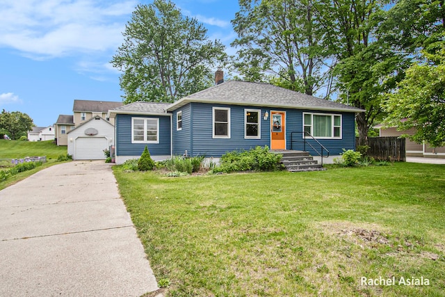7330 Byron Center Ave SW, Byron Center, MI 49315 - bungalow-style house with a chimney, an outbuilding, concrete driveway, a garage, and a shingled roof