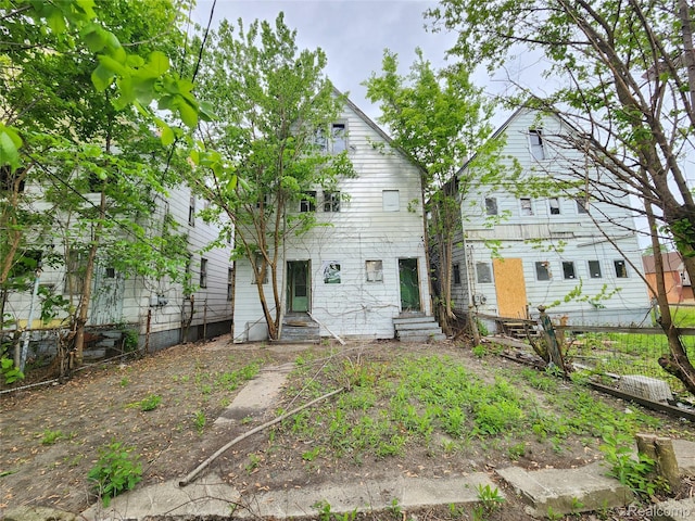 5120 Mcdougall St, Detroit, MI 48211 - rear view of property featuring entry steps