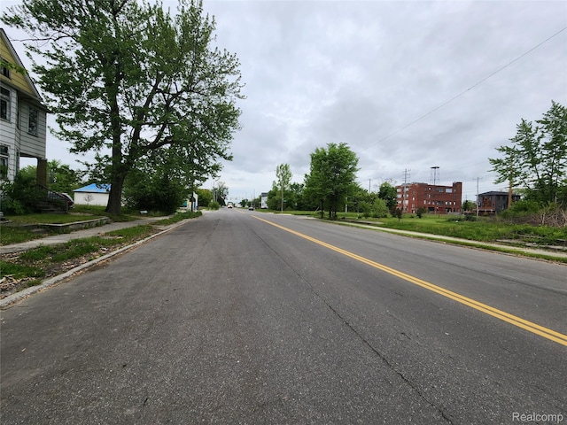 5120 Mcdougall St, Detroit, MI 48211 - view of asphalt street with sidewalks and curbs