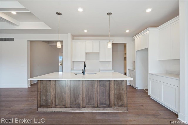 35704 Addison Dr, New Baltimore, MI 48047 - kitchen featuring a sink, white cabinetry, a large island, dark wood finished floors, and recessed lighting