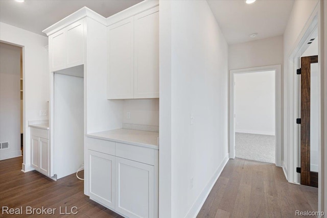 35704 Addison Dr, New Baltimore, MI 48047 - corridor with dark wood-style floors and baseboards
