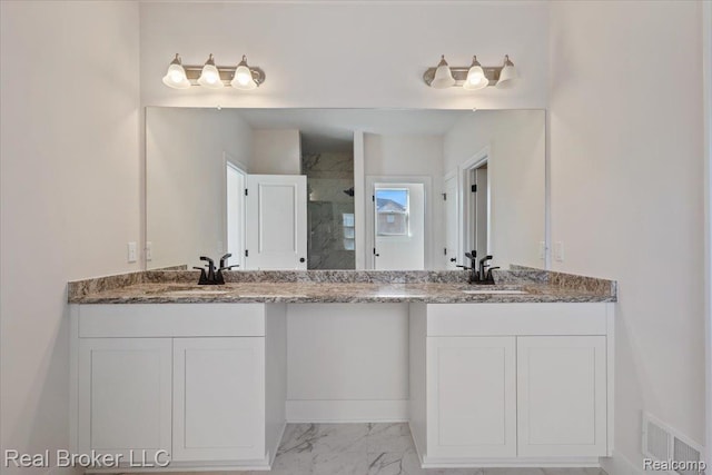 35704 Addison Dr, New Baltimore, MI 48047 - bathroom with vanity, a stall shower, and marble finish floors