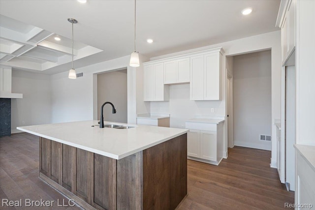 35704 Addison Dr, New Baltimore, MI 48047 - kitchen featuring a sink, white cabinets, recessed lighting, dark wood-style flooring, and coffered ceiling
