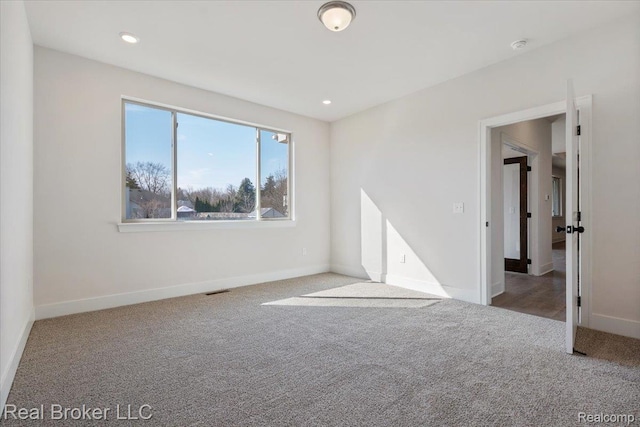 35704 Addison Dr, New Baltimore, MI 48047 - carpeted empty room featuring baseboards and recessed lighting