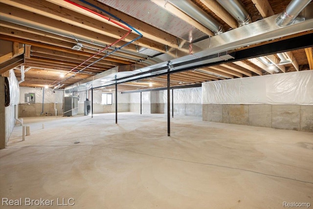 35704 Addison Dr, New Baltimore, MI 48047 - unfinished below grade area with water heater and electric panel