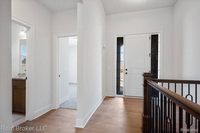 35704 Addison Dr, New Baltimore, MI 48047 - entryway featuring wood finished floors and baseboards