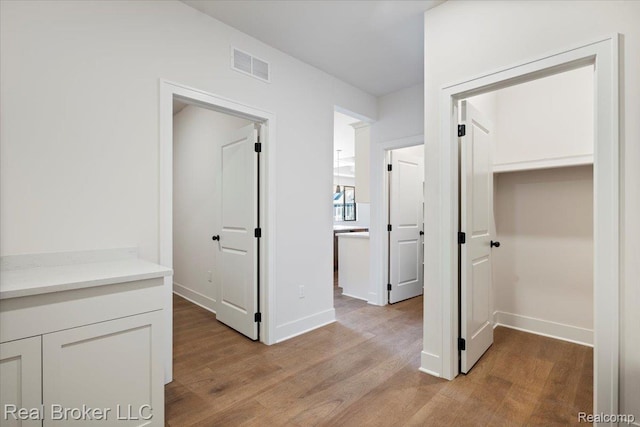 35704 Addison Dr, New Baltimore, MI 48047 - hallway with light wood-type flooring and baseboards