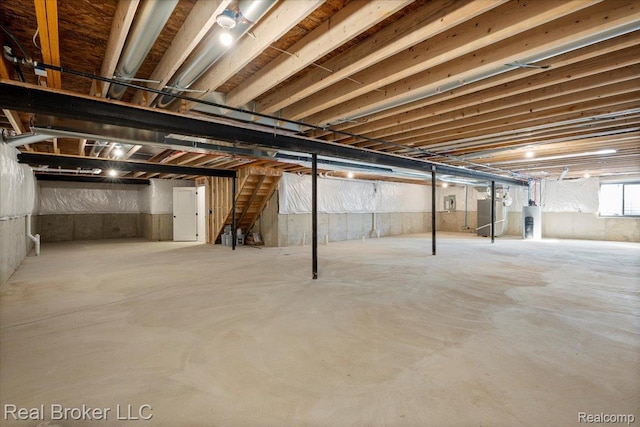 35704 Addison Dr, New Baltimore, MI 48047 - basement with water heater and stairway