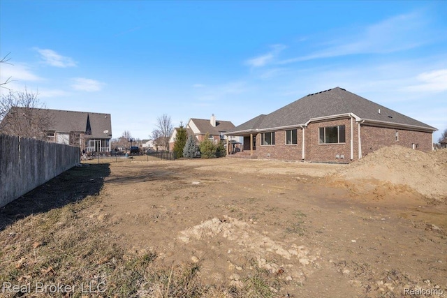 35704 Addison Dr, New Baltimore, MI 48047 - back of house featuring brick siding