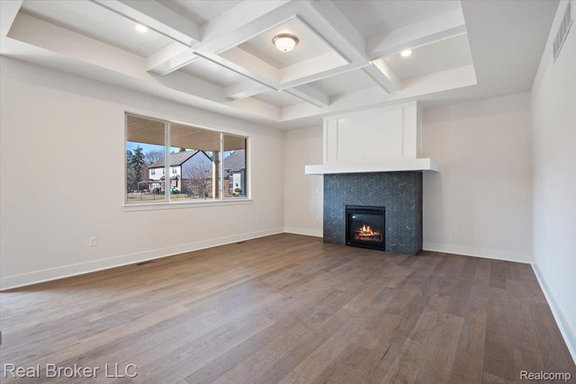 35704 Addison Dr, New Baltimore, MI 48047 - unfurnished living room featuring coffered ceiling, dark wood-type flooring, beamed ceiling, baseboards, and a tile fireplace