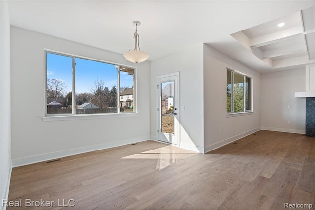 35704 Addison Dr, New Baltimore, MI 48047 - unfurnished living room with wood finished floors, baseboards, and recessed lighting