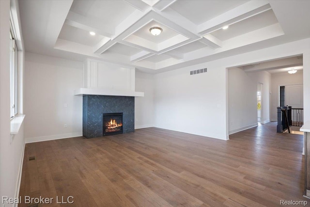 35704 Addison Dr, New Baltimore, MI 48047 - unfurnished living room with wood finished floors, a lit fireplace, coffered ceiling, baseboards, and beam ceiling