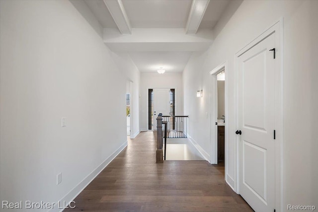35704 Addison Dr, New Baltimore, MI 48047 - hall featuring dark wood-style flooring, beamed ceiling, baseboards, and an upstairs landing