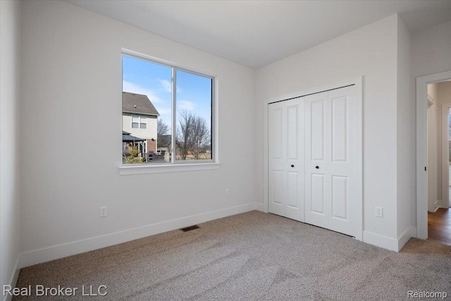 35704 Addison Dr, New Baltimore, MI 48047 - unfurnished bedroom featuring carpet floors and baseboards