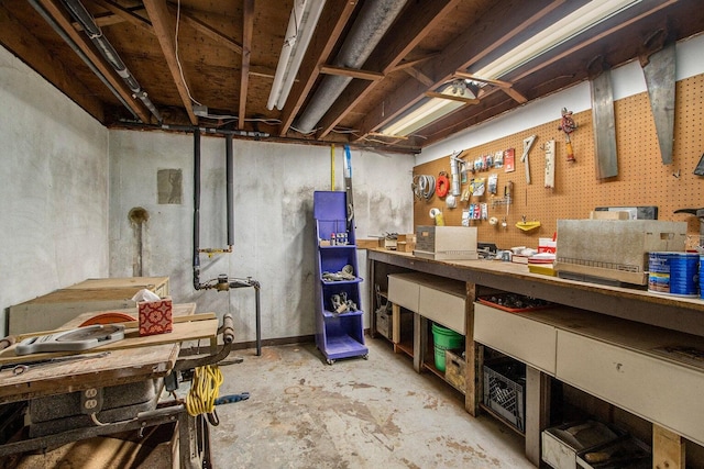 3313 Gethings Rd, Battle Creek, MI 49015 - unfinished below grade area featuring a workshop area