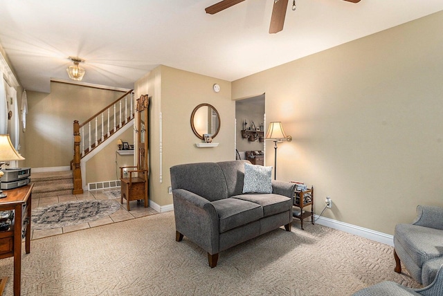 3313 Gethings Rd, Battle Creek, MI 49015 - carpeted living room with stairway, ceiling fan, and baseboards