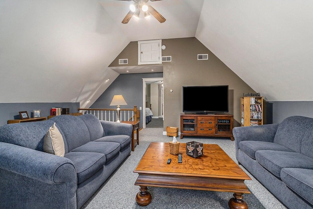 3313 Gethings Rd, Battle Creek, MI 49015 - living area featuring a ceiling fan, vaulted ceiling, and carpet floors