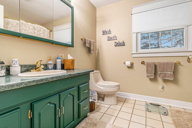 3313 Gethings Rd, Battle Creek, MI 49015 - bathroom with tile patterned flooring, vanity, baseboards, toilet, and a shower with shower curtain